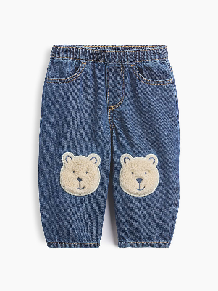 Image 1 of 3, Authentic, non-stretch denim pull-on baby jeans., Elasticized waist and faux fly., Front scoop pockets, back patch pockets., Sherpa knee patches with embroidered Brannan Bear detail., Medium wash., Responsibly Made: This pair of jeans is part of our water-saving Washwell program. Compared with conventional wash methods, Washwell uses at least 20% less water., Responsibly Made: This pair of jeans is part of our water-saving Washwell program. Compared with conventional wash methods, Washwell uses at least 20% less water. More Sustainable Cotton: Made with 5% recycled cotton. Compared to virgin materials, using recycled materials helps reduce resource use and waste., Product #913724