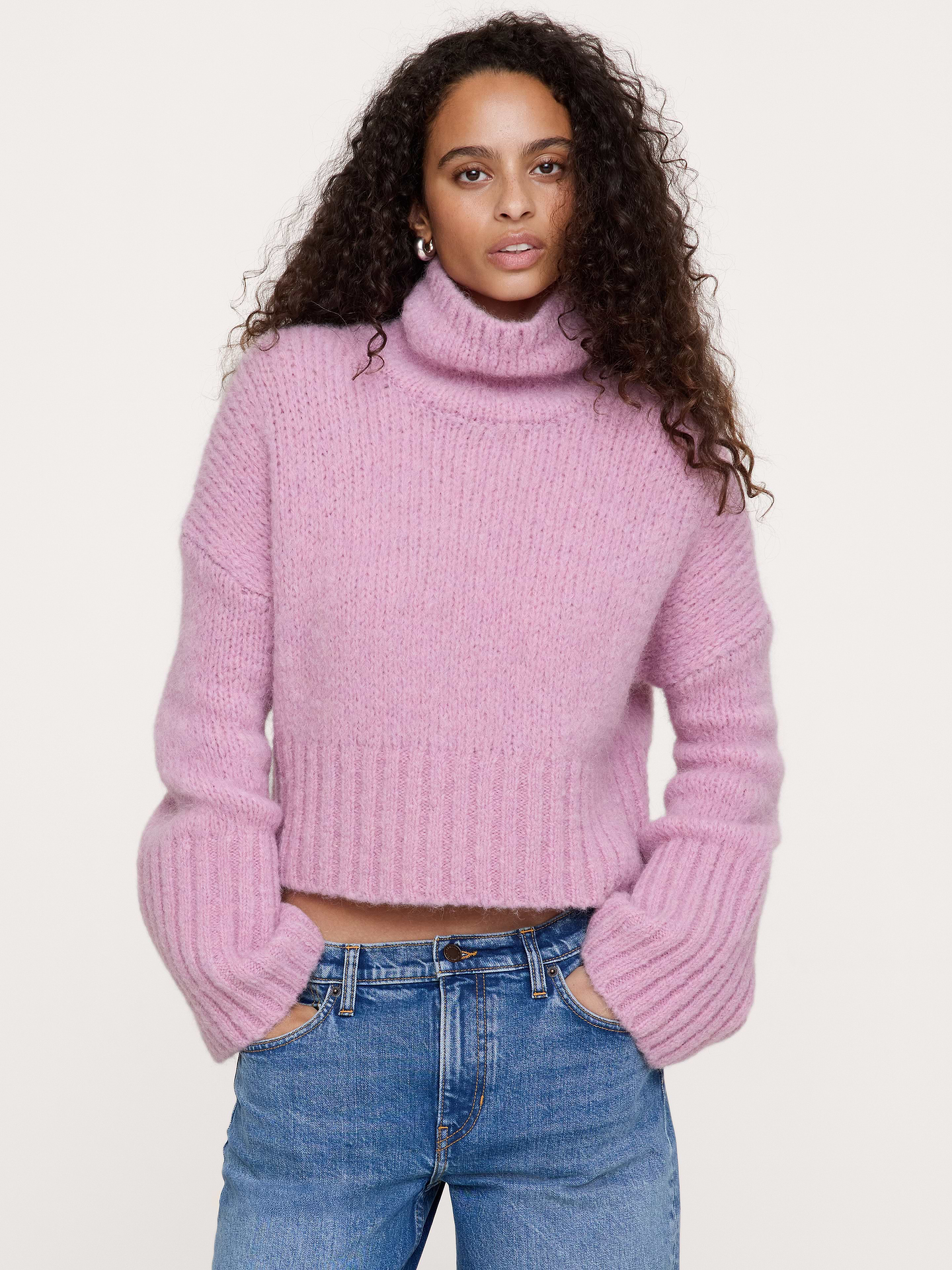 Image 1 of 6, Spun from a soft alpaca blend for extra cozy appeal, this cropped sweater is cut for a loose fit that's easy to layer through the seasons., Ultra-Oversized Fit: Lots of room through chest, shoulders, and waist. Dropped shoulder seam., Fabric from Italy's Pinori Filati mill., Funnel neck., Flare sleeves., Straight hem., Product #1180215