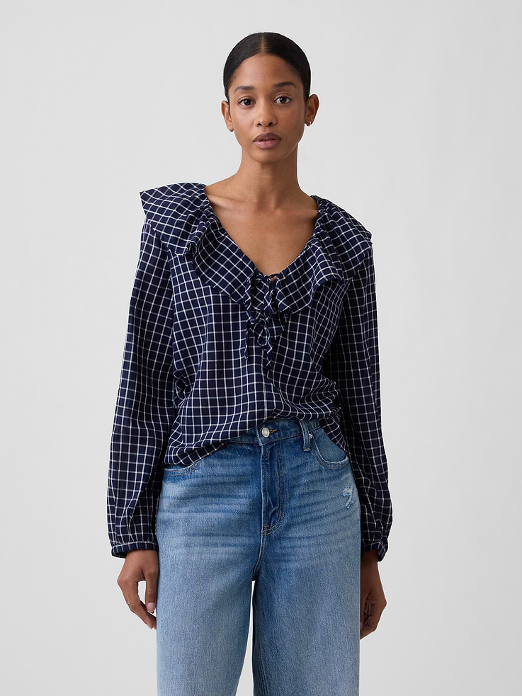 Image 1 of 5, Smooth weave., Dropped shoulder, long balloon sleeves with elasticized cuffs., Ruffle trim and drawcord ties at V-neck., Select styles have allover print., Product #1178549