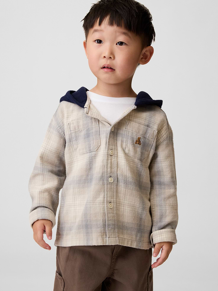 Image 1 of 3, Soft cotton flannel button-up shirt with a double-layered fleece hood., Double-layered fleece hood., Long sleeves with button cuffs., Button front., Chest patch pockets., Embroidered Brannan Bear at front., Allover plaid., Product #912548