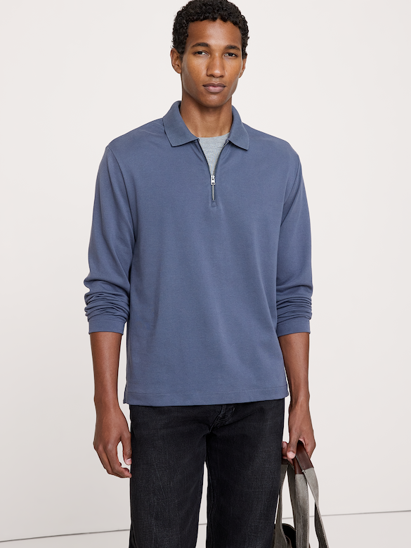 Polo luxueux à glissière au quart