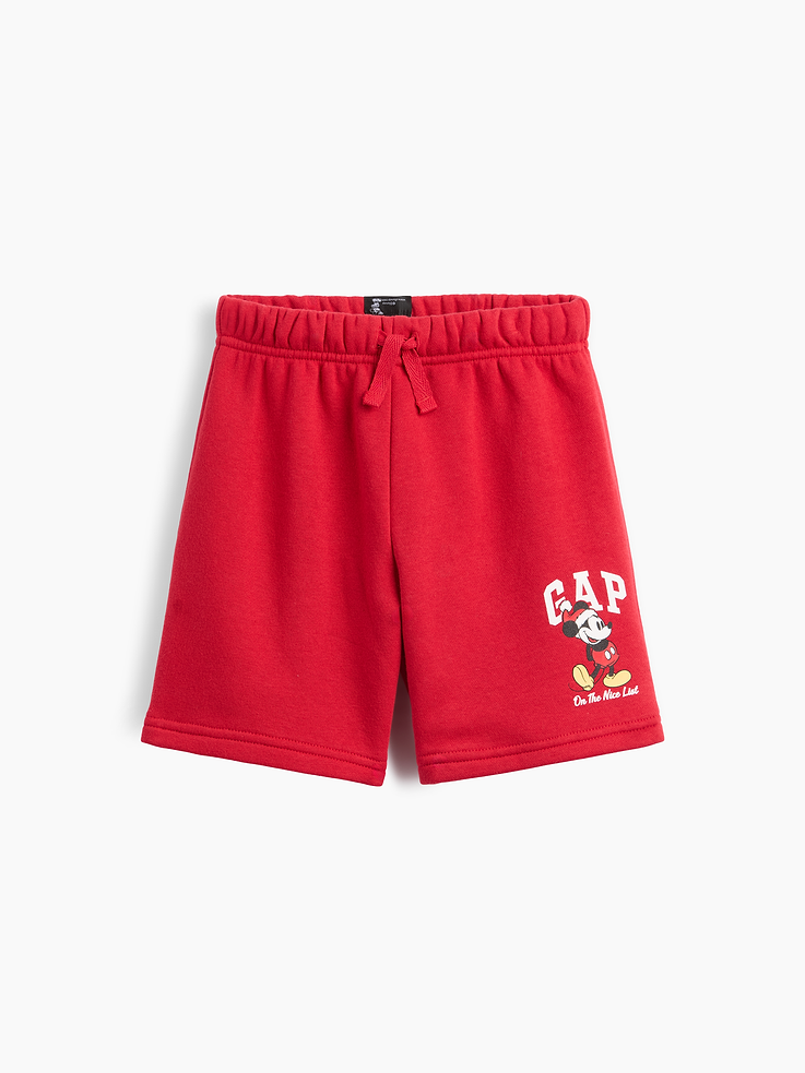 Image 1 of 3, A very special collaboration between Gap and Disney— two timeless, iconic American brands— led us to create a collection that celebrates Mickey Mouse and Minnie Mouse., This product is made with/contains 23% recycled polyester. Compared to virgin materials, using recycled materials helps reduce resource use and waste., Soft, comfy fleece., Drawcord ties at elasticized waist are functional for sizes 2Y-6Y., Gap logo with Mickey Mouse graphic at hem., This product was made in a factory that invests in gender equity and women’s empowerment through RISE. Learn more at, Product #1185206