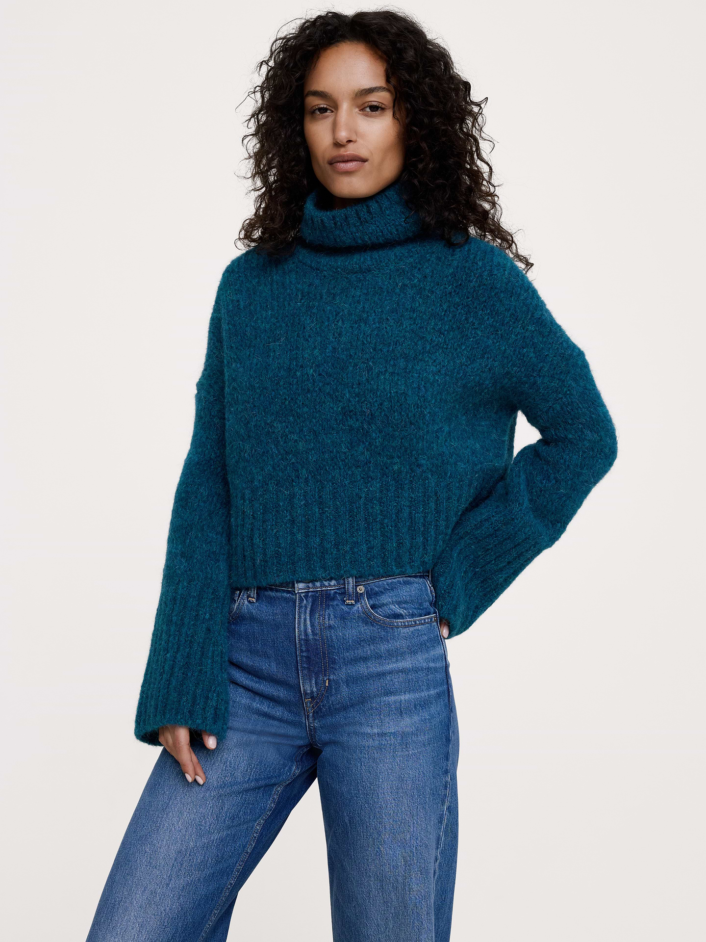 Image 1 of 6, Spun from a soft alpaca blend for extra cozy appeal, this cropped sweater is cut for a loose fit that's easy to layer through the seasons., Ultra-Oversized Fit: Lots of room through chest, shoulders, and waist. Dropped shoulder seam., Fabric from Italy's Pinori Filati mill., Funnel neck., Flare sleeves., Straight hem., Product #1180215