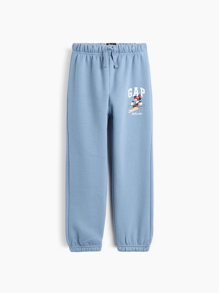 Image 1 of 3, A very special collaboration between Gap and Disney— two timeless, iconic American brands— led us to create a collection that celebrates Mickey Mouse and Minnie Mouse., This product is made with/contains 23% recycled polyester. Compared to virgin materials, using recycled materials helps reduce resource use and waste., Soft, comfy fleece., Drawcord ties at elasticized waist are functional for sizes 2T-5T., Gap logo with graphic at hip., Elasticized cuffs., Product #1179520