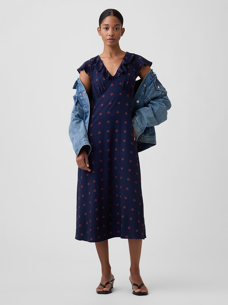Image 1 of 4, Smooth weave., Short flutter sleeves., Ruffle trim at V-neck., Select styles have allover print., Product #1179463