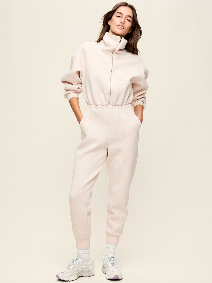 Image 1 of 9, Featuring Bounce Fleece. A smooth, cooling finish that feels good and looks chic everywhere you go., funnel collar, half-zip closure, long sleeves, on-seam pockets, rib-knit cuffs, Product #903716