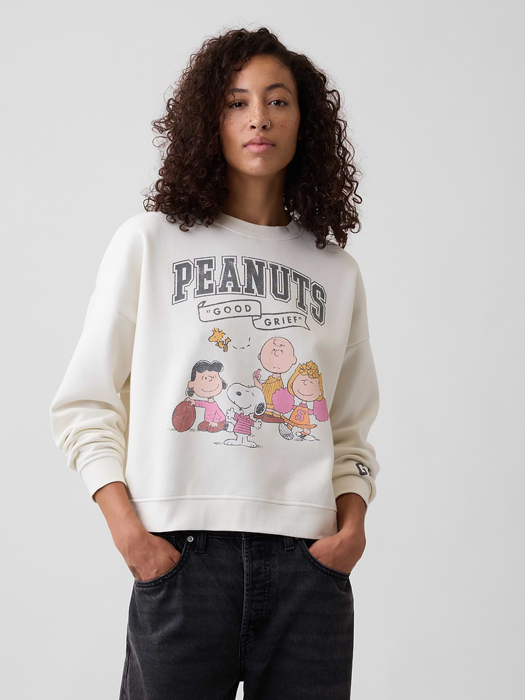 Image 1 of 5, Soft, comfy fleece., Dropped shoulder, long sleeves with banded cuffs., Crewneck., Gap logo with graphic at front., Banded wedge hem., Product #1174939