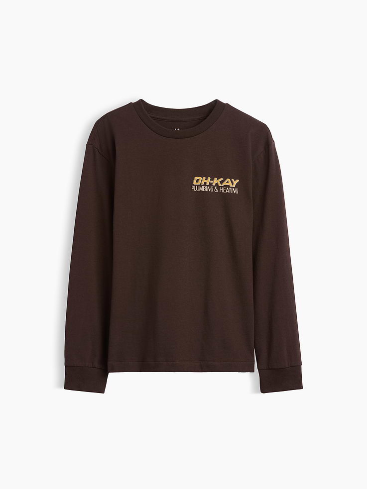 Image 1 of 3, Soft cotton jersey T-shirt. In a relaxed fit., Crewneck., Long sleeves with banded cuffs., Graphics at front and back., Made with 60% Protocol cotton verified by the U.S. Cotton Trust Protocol, a program which works with farms committed to improving their environmental footprint by minimizing water usage and improving soil health (Claim No. 10127)., This product was made in a factory that invests in gender equity and women’s empowerment through RISE. Learn more at gapinc.com/equity ., Product #1183456
