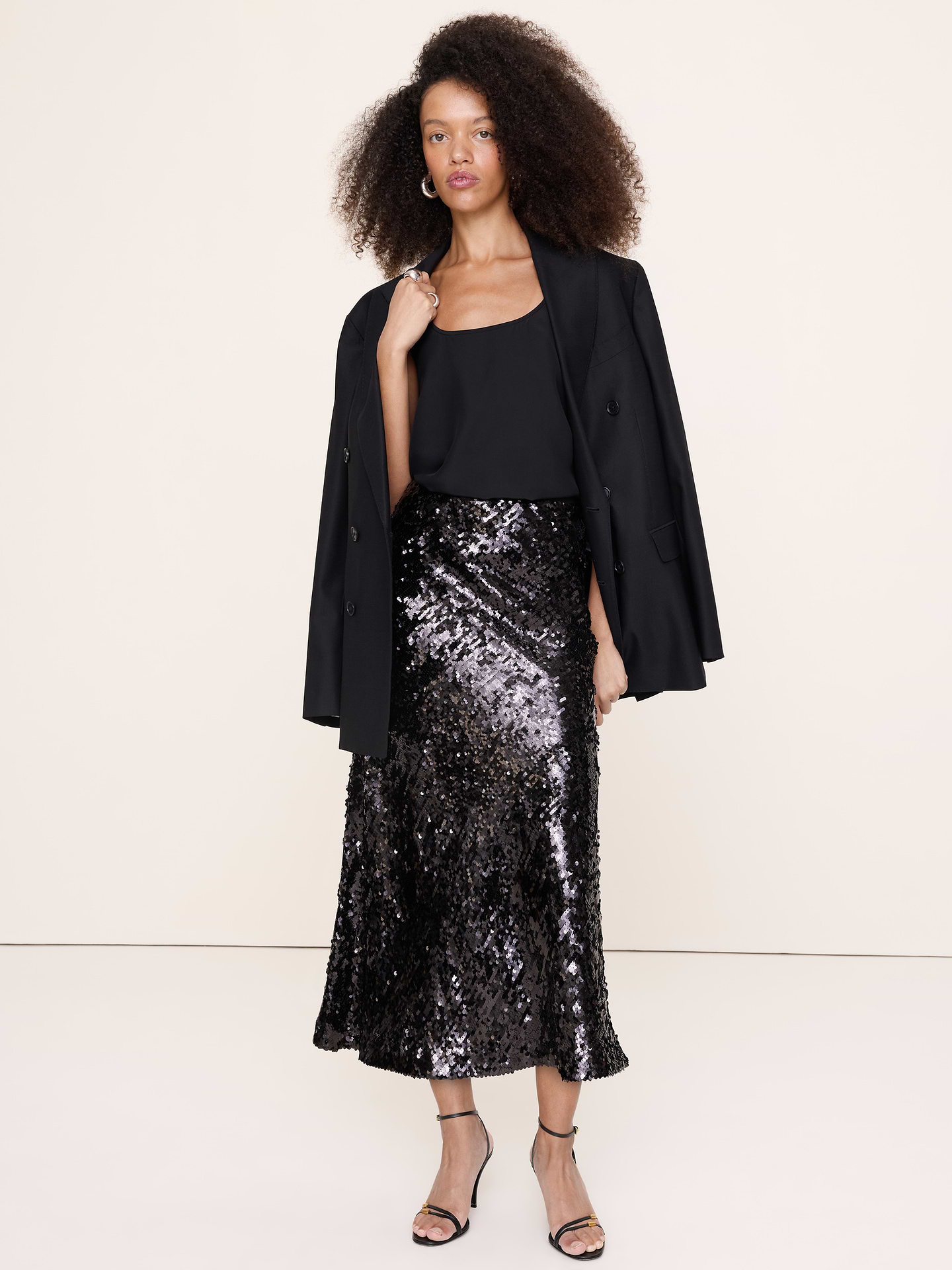 Image 1 of 3, We crafted this figure-hugging maxi skirt from a high-gloss sequin fabric, expertly cut on the bias for beautiful drape., A-Line fit: High rise. Fitted waist with a flare silhouette., Elastic waistband (pull-on design)., Fully lined., Product #1180123