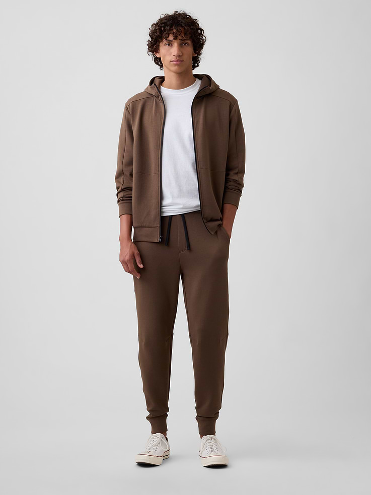 Image 1 of 6, Breathable fleece knit with stretch., Drawcord ties at elasticized waist (select styles may or may not have hardware around ties)., Front slant pockets., Seam details at knees., Banded cuffs., This product was made in a factory that invests in gender equity and women’s empowerment through RISE. Learn more at, Product #626190