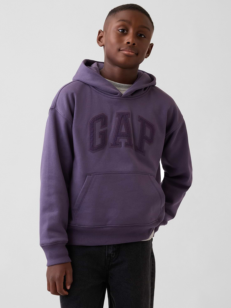 Image 1 of 6, Our softer than soft sweats. Brushed on the inside. Smooth on the outside. Made so that no two are alike., Soft cotton-blend fleece hoodie. In an oversized fit., Hooded neckline., Long sleeves with drop shoulders., Gap logo at front., Kanga pocket., Banded rib cuffs and hem., Made with 52% Protocol cotton verified by the U.S. Cotton Trust Protocol, a program which works with farms committed to improving their environmental footprint by minimizing water usage and improving soil health (Claim No. 10127)., Made with 23% recycled polyester. Compared to virgin materials, using recycled materials helps reduce resource use and waste., Product #1182594