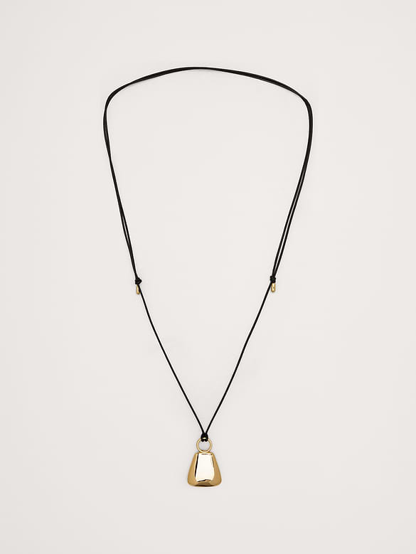 Collier en cordon de cuir avec pendentif en forme de flacon