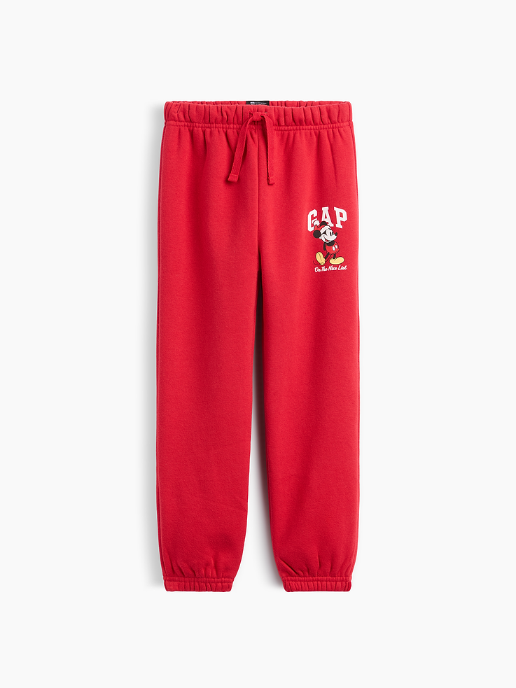 Image 1 of 3, A very special collaboration between Gap and Disney— two timeless, iconic American brands— led us to create a collection that celebrates Mickey Mouse and Minnie Mouse., This product is made with/contains 23% recycled polyester. Compared to virgin materials, using recycled materials helps reduce resource use and waste., Soft, comfy fleece., Drawcord ties at elasticized waist are functional for sizes 2T-5T., Gap logo with graphic at hip., Elasticized cuffs., Product #1179520