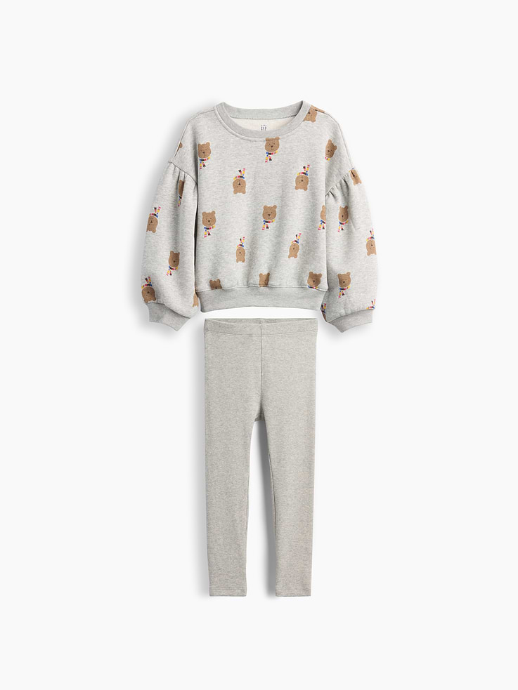 Image 1 of 2, Soft cotton-blend fleece sweatshirt and ribbed cotton leggings outfit set., Crewneck., Long bubble sleeves with puffed drop shoulders., Allover print., Banded rib cuffs and hem., Elasticized waist at pants., Top made with 21% recycled polyester. Compared to virgin materials, using recycled materials helps reduce resource use and waste., This product was made in a factory that invests in gender equity and women’s empowerment through RISE. Learn more at gapinc.com/equity ., Product #1184975