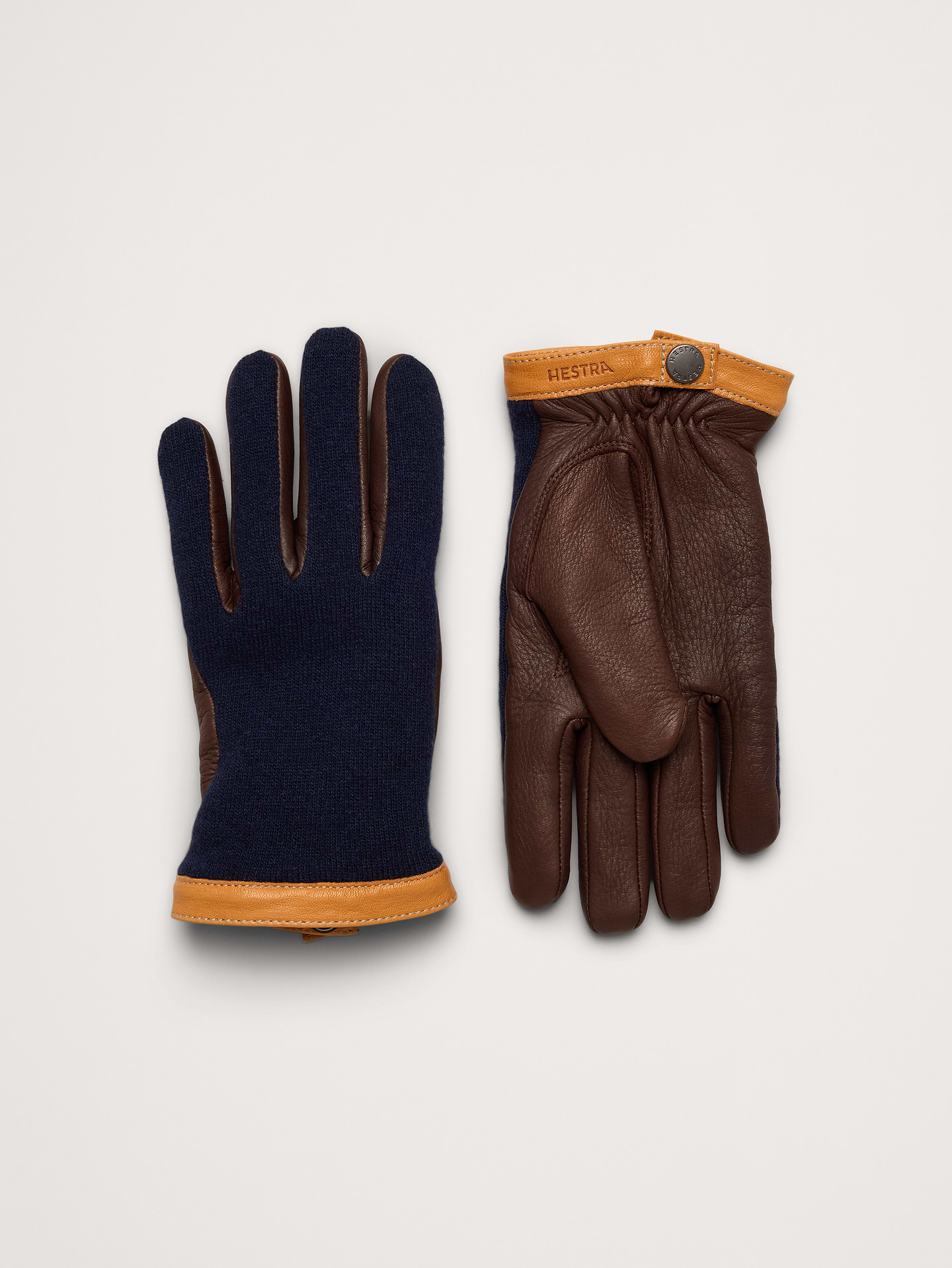 Image 1 of 5, Mixed-media style with a rugged look, the Deerskin Wool Tricot glove gives you a sleek, cool look. Wool blend lining provides nice warmth on mild to chilly days., Hestra: Family-run since 1936, crafting high-quality gloves in Sweden for all hand—from lumberjacks to skiers and now to you., Fully lined in a Merino-wool blend., Product #1180428
