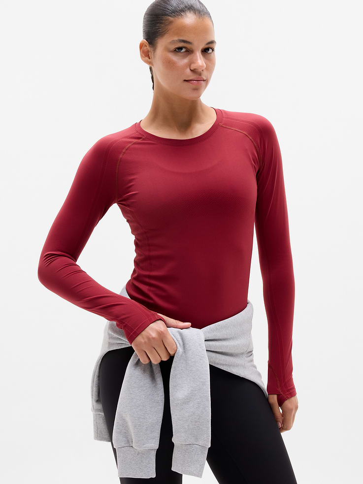 Image 1 of 7, FOR: Medium to high-impact workouts at the gym, studio, or outdoors, FEEL: Enhanced yarns deliver soft stretch and quick recovery, keeping you comfortable while you push your limits, FAVE: The workout top you love, now with upgraded stretch, sweat-wicking power, and sleek style, Seamless construction for minimal chafing, Functional mesh panels allow for optimal movement and breathability, Thumbholes lock your fit in place, Grippers at inner hem prevent it riding up, Product #845688