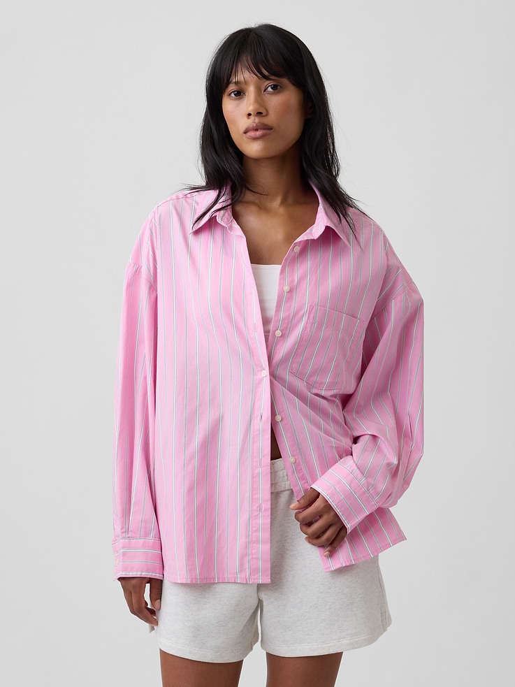 Image 1 of 5, Smooth poplin weave., Dropped shoulder, long sleeves with button cuffs., Spread collar, button front., Patch pocket at chest., Curved shirttail hem is slightly longer at back., Allover stripes., This product was made in a factory that invests in gender equity and women’s empowerment through RISE. Learn more at, Product #1176618