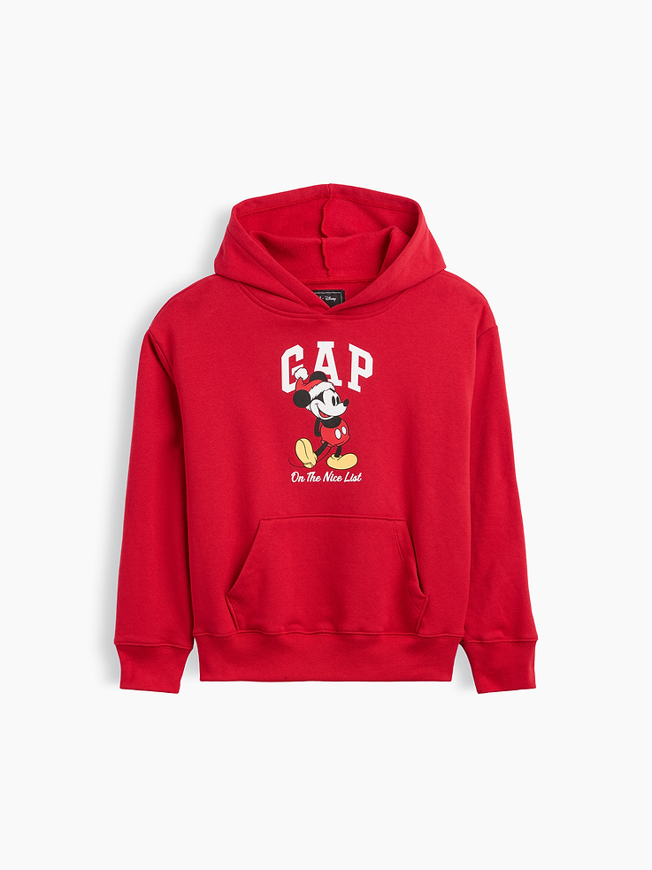 Image 1 of 3, A very special collaboration between Gap and Disney— two timeless, iconic American brands— led us to create a collection that celebrates Mickey Mouse and Minnie Mouse., This product is made with/contains at least 23% recycled polyester. Compared to virgin materials, using recycled materials helps reduce resource use and waste., Soft, comfy fleece., Dropped shoulder, long sleeves with banded cuffs., Hood., Gap logo with Mickey Mouse graphic at front., Kanga pocket., Banded hem., Product #1187817