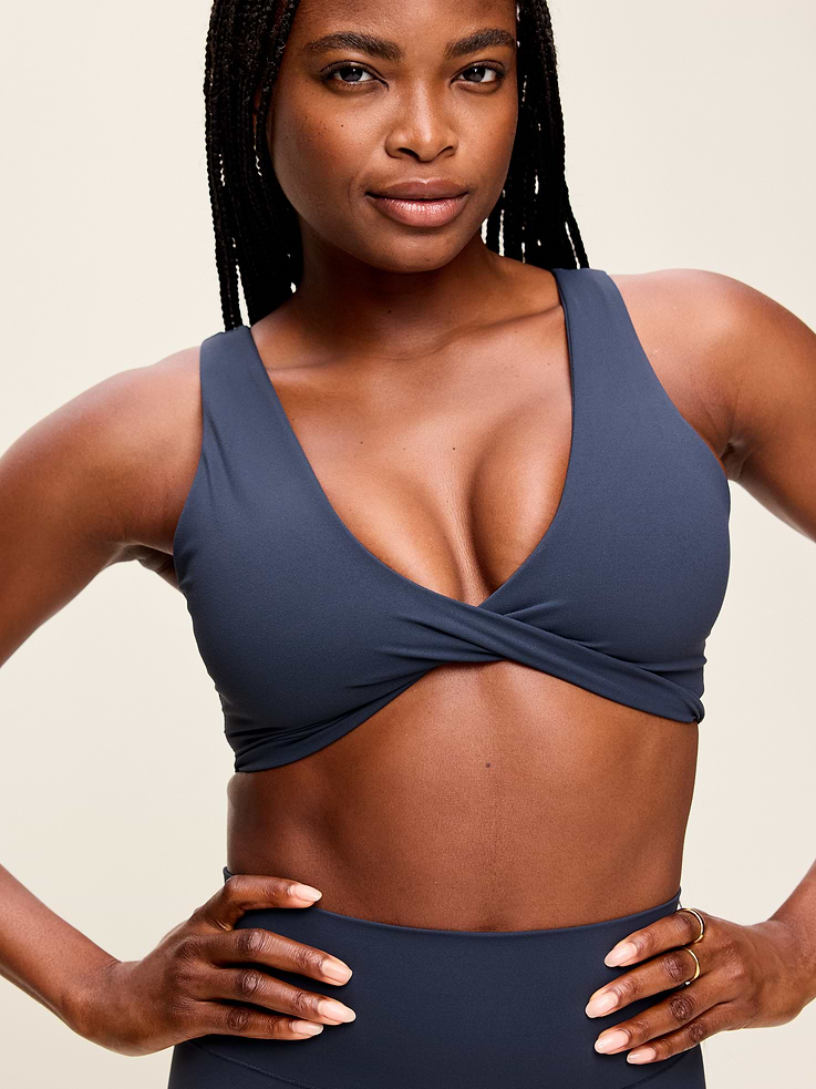 Image 1 of 8, Featuring StudioSmooth. Buttery soft, breathable fabric with a barely there feel., twist-front, shelf bra, Product #903768