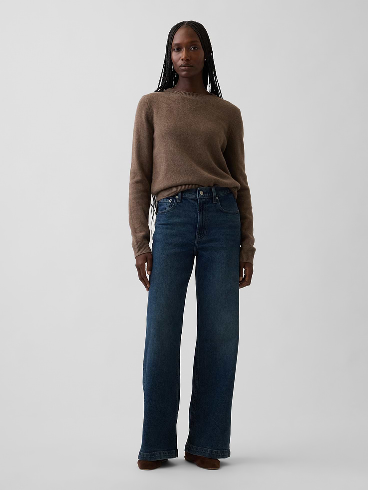 Image 1 of 6, Fit: Fitted in the waist & hips with a full-length, relaxed wide leg. This jean has a loose fit – size down for a slimmer fit., Fabric: 99% Cotton, 1% Stretch., Stretch: Low Stretch Jeans. Our most comfortable authentic denim. Holds you in at the hips & waist but feels easy everywhere else., Rise: High Rise Jeans., Look: A classic five-pocket jean in a dark tint wash., Details: Zip fly & five-pocket styling., Responsibly Made: This pair of jeans is part of our water-saving Washwell program. Compared with conventional wash methods, Washwell uses at least 20% less water., More Sustainable Cotton: Made with 5% recycled cotton. Compared to virgin materials, using recycled materials helps reduce resource use and waste., Explore our GapJeans Guide ., Product #1185301