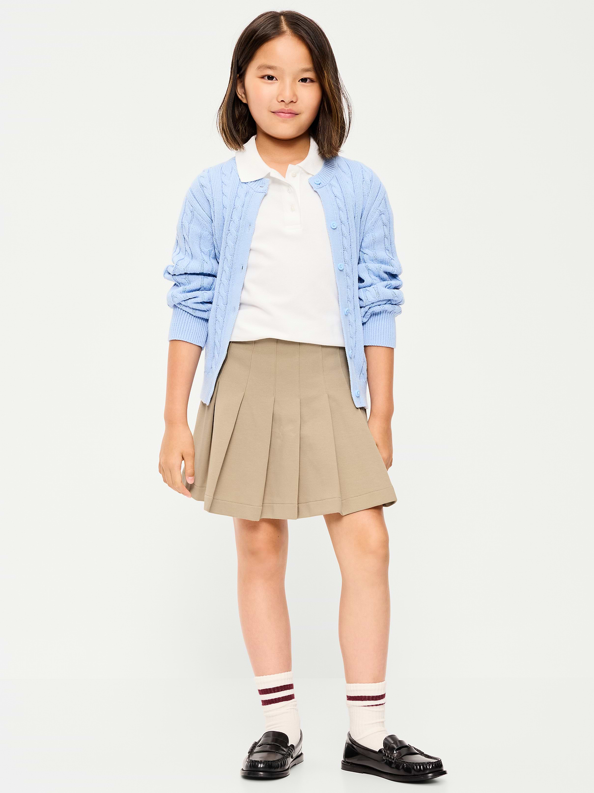 L'image numéro 1 présente Jupe-short à plis d’uniforme scolaire en tricot point de Rome pour fille