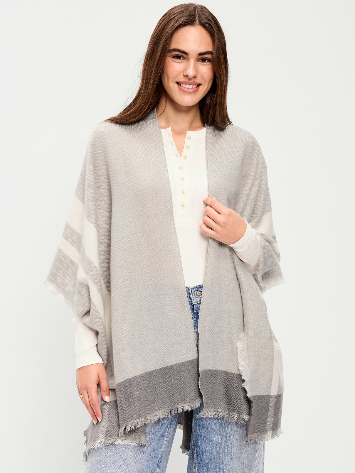 L'image numéro 1 présente Poncho en flanelle à franges.