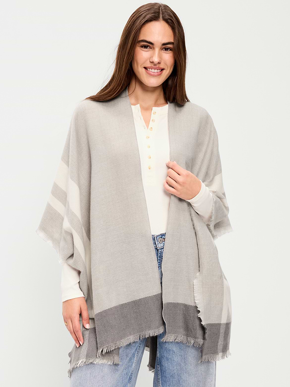 Poncho en flanelle à franges.