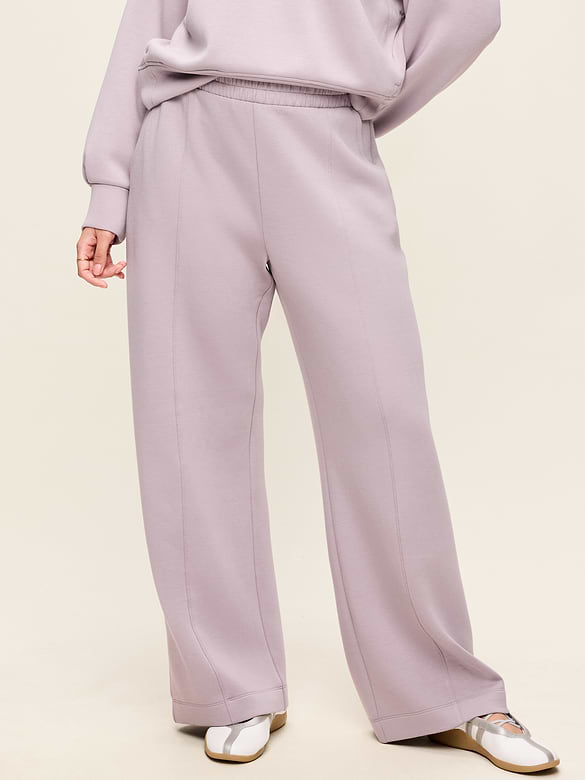 Pantalon jambe large à taille haute en molleton qui reprend sa forme