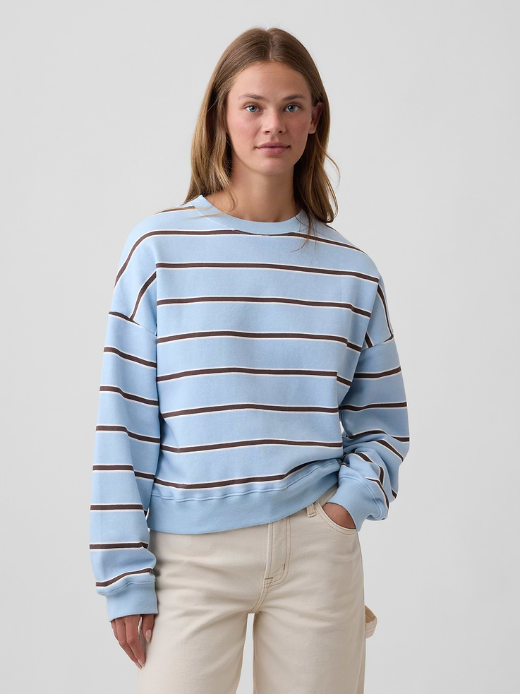 Image 1 of 5, Soft, comfy fleece., Dropped shoulder, long sleeves with banded cuffs., Crewneck., Banded hem., Select styles have allover stripes., This product was made in a factory that invests in gender equity and women’s empowerment through RISE. Learn more at, Product #1187934