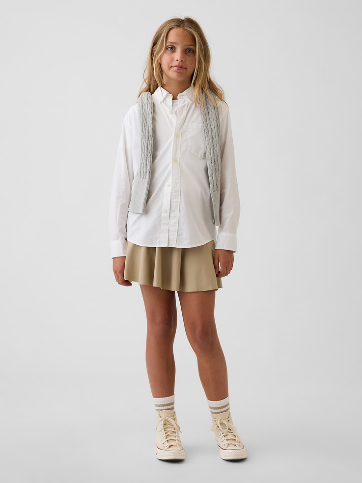 Image 1 de 4, Jersey extensible doux, respirant et anti-moiteur., Tissu anti-moiteur qui garde la peau au sec., Taille élastique à bande., Détail plissé., Short intégré., Fait de polyester recyclé à 87 %. Comparativement aux matières vierges, l’utilisation de matières recyclées permet de réduire l’utilisation des ressources et le gaspillage., Ce produit a été fabriqué dans une usine qui investit dans l’égalité des genres et l’autonomisation des femmes grâce au programme Reimagining Industry to Support Equality (RISE). Pour en savoir plus, visitez gapinc.com/equite ., Produit #791566