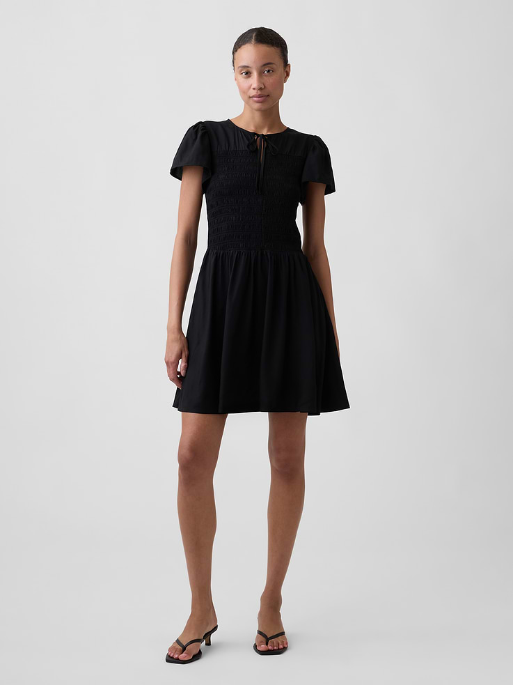 Image number 1 showing, Smocked Flutter Sleeve Mini Dress