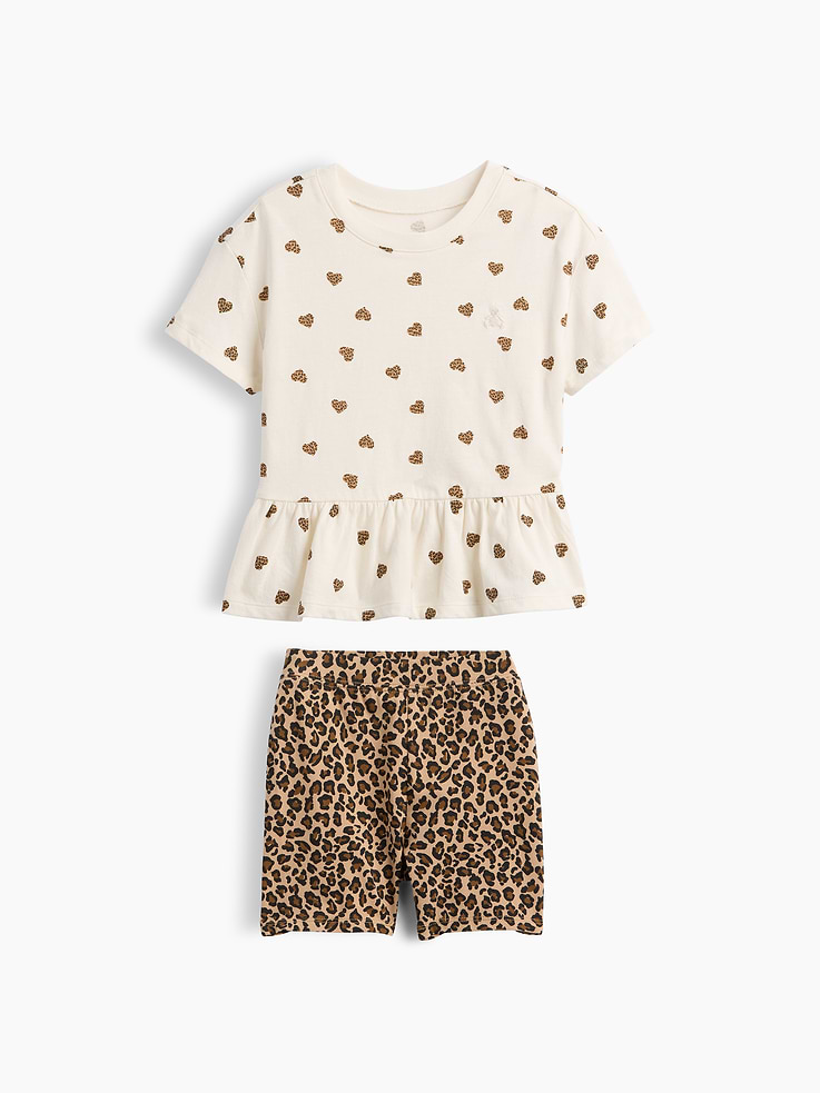 Image 1 of 3, Soft cotton top with stretch jersey bike shorts., Dropped shoulder, short sleeves., Crewneck., Shirring at peplum hem., Elasticized waist., Allover print., Product #1187812