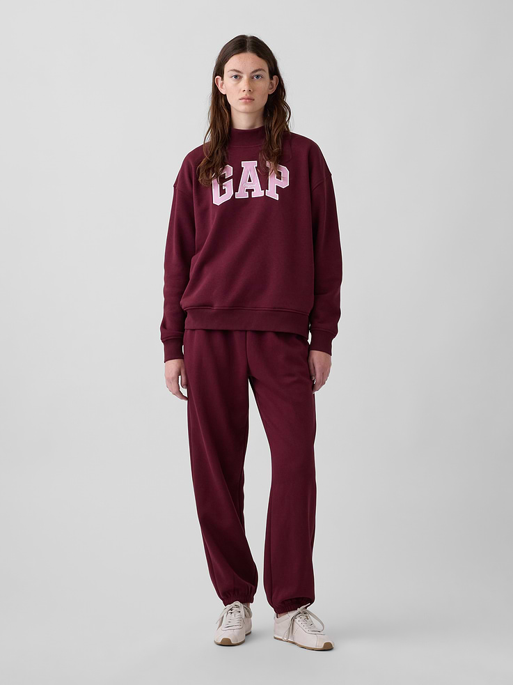 Image 1 of 6, Our softer than soft sweats. Brushed on the inside. Smooth on the outside. Made so that no two are alike., Soft cotton-blend fleece joggers in a relaxed fit., Elasticized waist with inner drawcords., Side on-seam pockets., Elasticized cuffs., Made with 23% recycled polyester. Compared to virgin materials, using recycled materials helps reduce resource use and waste., Explore our GapSweats Guide ., Product #903064