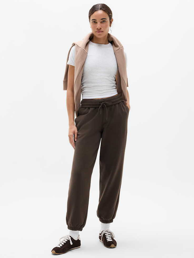 Image 1 of 8, FOR: Lounge and everyday movement, FEEL: Plush stretch fleece has a soft, brushed interior, FAVE: New and improved three-track waistband for extra support, Easy-access pockets to stash your essentials, Product #1174475