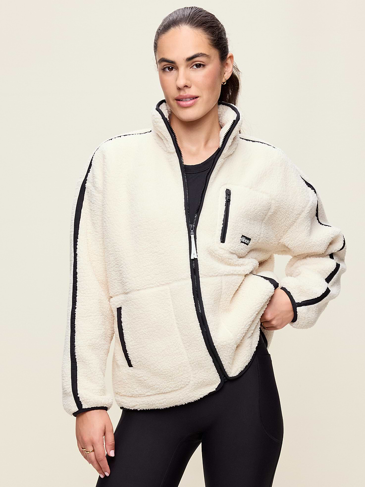 Image 1 of 9, quarter-zip funnel neck, long drop shoulder sleeves, front pockets, elastic cuffs and hem, Product #907272