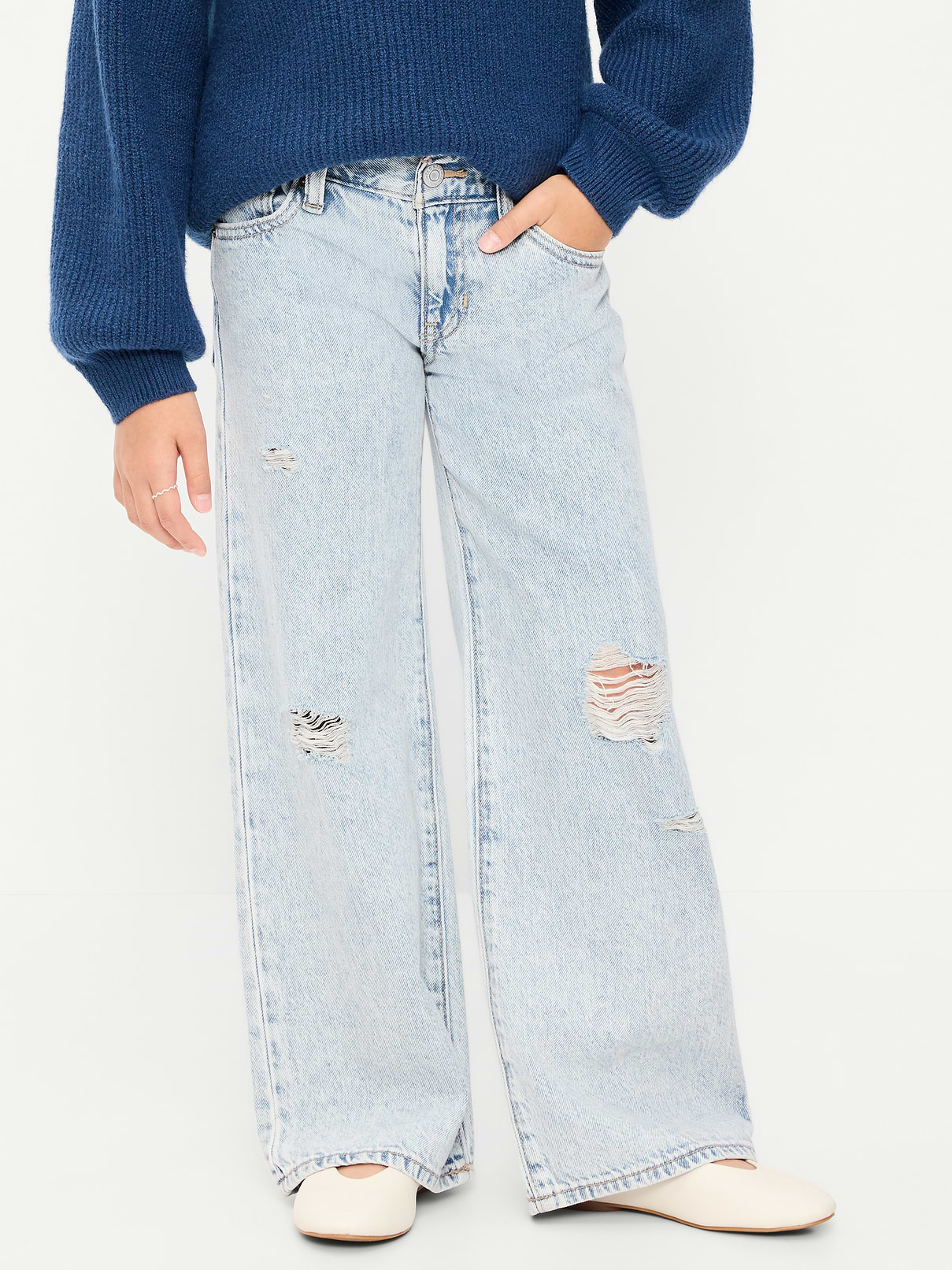 Image 1 of 4, low rise, interior adjustable waistband, snap button closure (sizes 5-8), regular button closure (sizes 10-20), zip fly, scoop pockets and coin pocket, patch pockets at back, slight tears/rips at front for a lived-in feel, wide leg opening, Product #908684