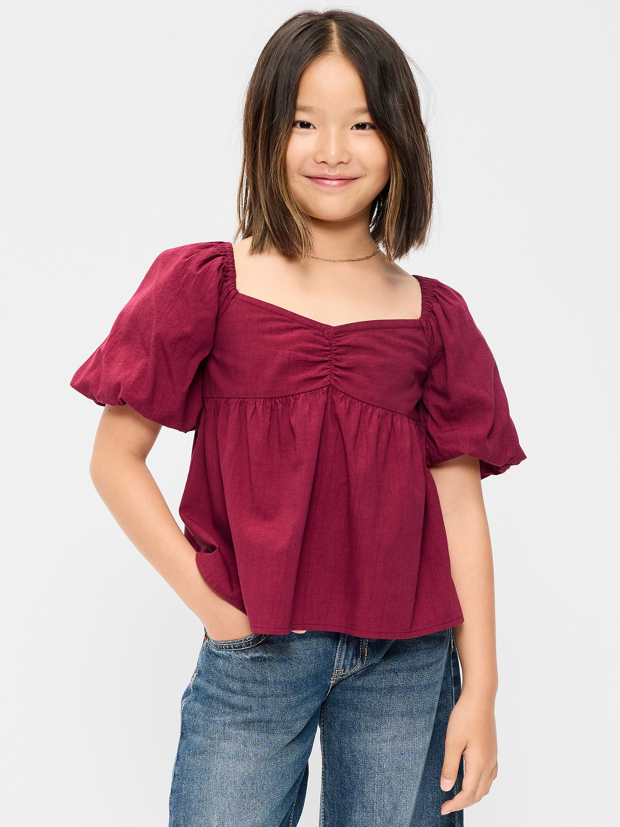 L'image numéro 1 présente Haut froissé à manches bouffantes à nouer au dos pour fille