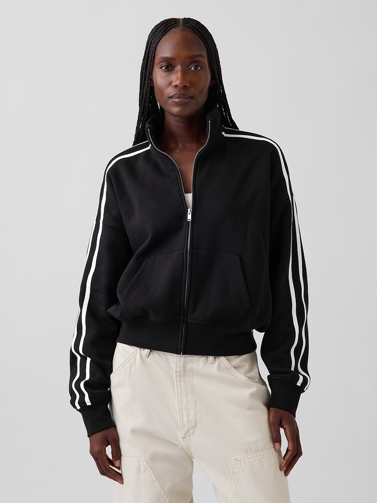 Image 1 of 7, Soft cotton-blend fleece, full-zip jacket. In an oversized fit and slightly cropped length., Mockneck, zipper front., Long sleeves with drop shoulders and taped double side stripes., Kanga pockets., Banded rib cuffs and hem., Made with 52% Protocol cotton verified by the U.S. Cotton Trust Protocol, a program which works with farms committed to improving their environmental footprint by minimizing water usage and improving soil health (Claim No. 10127)., Made with 23% recycled polyester. Compared to virgin materials, using recycled materials helps reduce resource use and waste., Product #1188195