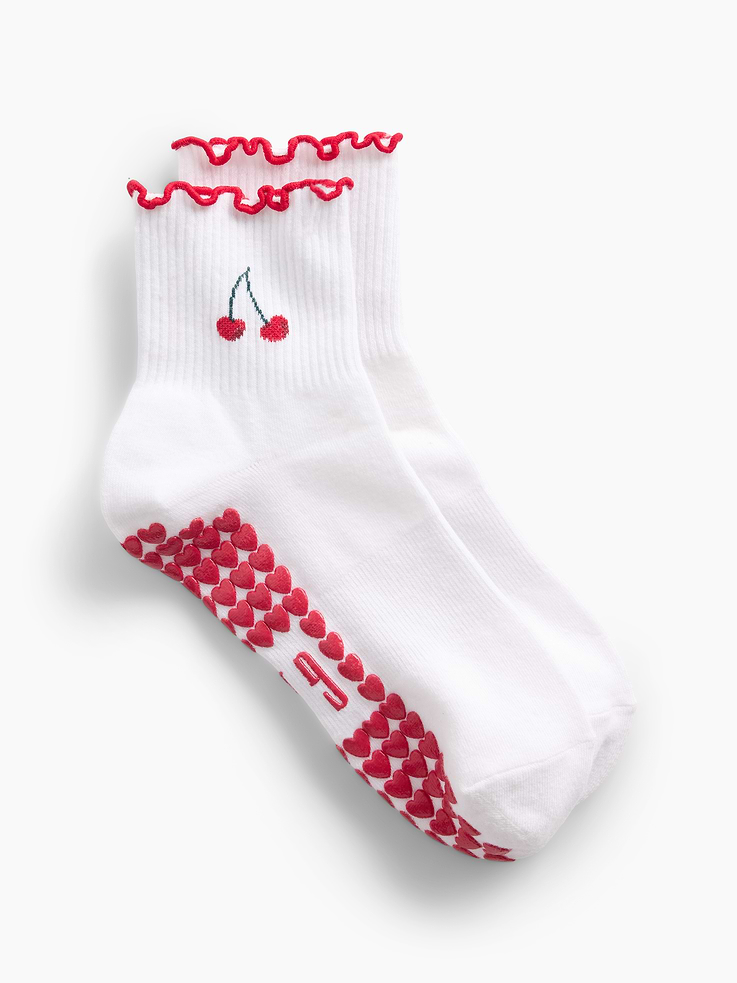 Image 1 of 2, Soft, stretch knit half-crew socks., Ribbed top., Reinforced toe and heel., Heart detailing at top or bottom., Made with 12% recycled polyester. Compared to virgin materials, using recycled materials helps reduce resource use and waste., This product was made in a factory that invests in gender equity and women’s empowerment through RISE. Learn more at gapinc.com/equity ., Product #1185702