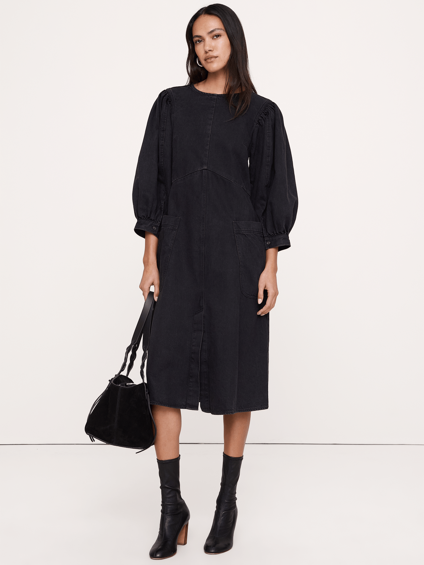 Image 1 of 4, Rigid denim, puff sleeves, and a midi length—this structured cotton dress means business and still manages to have a little fun., Fit & Flare: Relaxed through chest and shoulders, fitted waist with a flare skirt., Product #915554