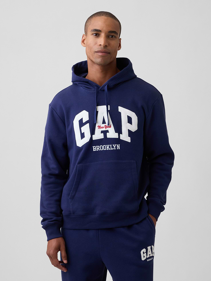 Image 1 of 4, This product is made with/contains 23% recycled polyester. Compared to virgin materials, using recycled materials helps reduce resource use and waste., Soft, comfy fleece., Dropped shoulder, long sleeves with banded cuffs., Drawcord ties at hood., Gap Brooklyn logo at front., Kanga pockets., Banded hem., Product #1182523