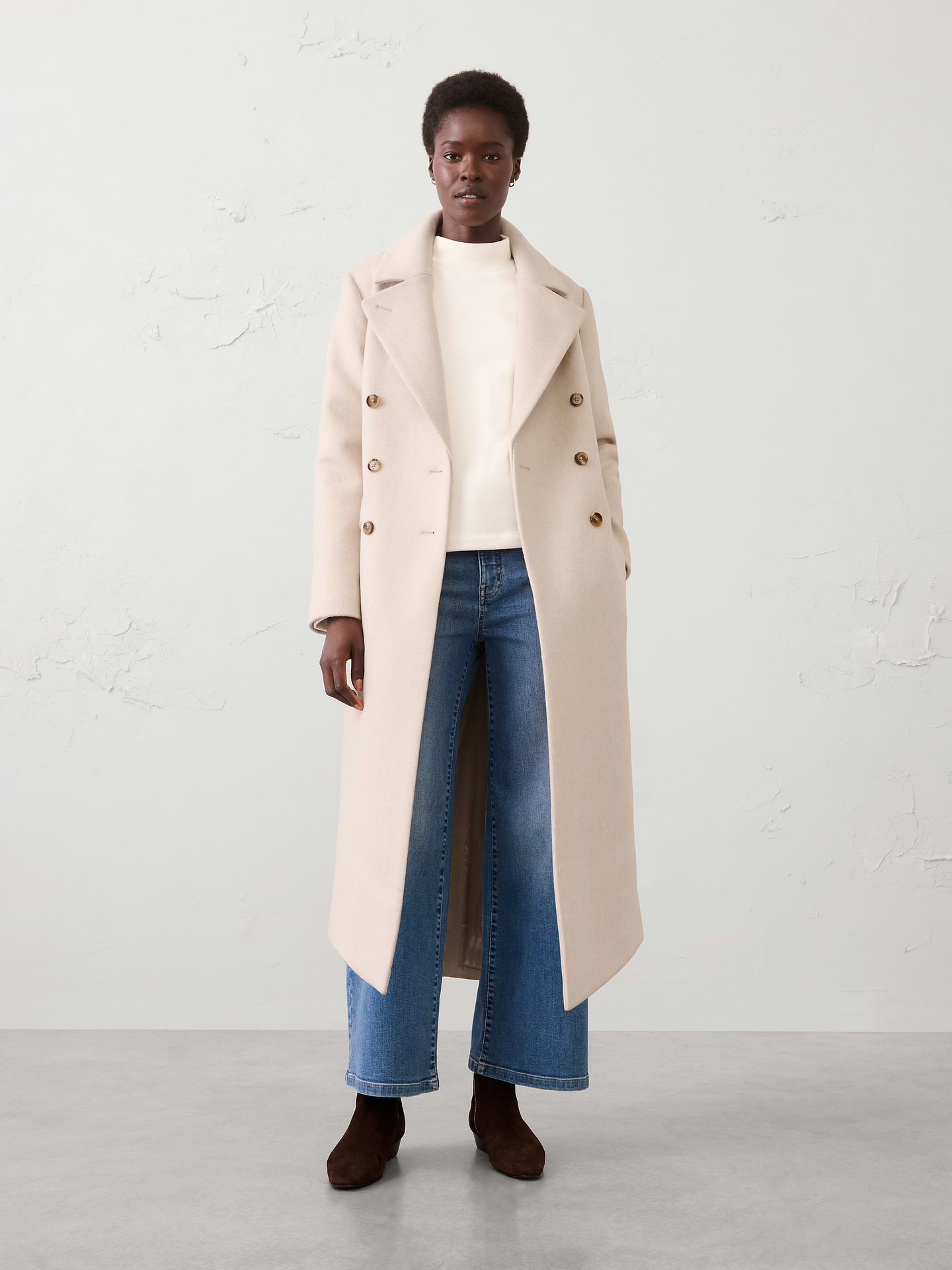 Image 1 of 7, Notched lapel collar. Long sleeves., Double‑breasted front closure., Front flap pockets., Center back vent., Straight silhouette., Fully lined., Made exclusively for Banana Republic Factory., Product #1176818