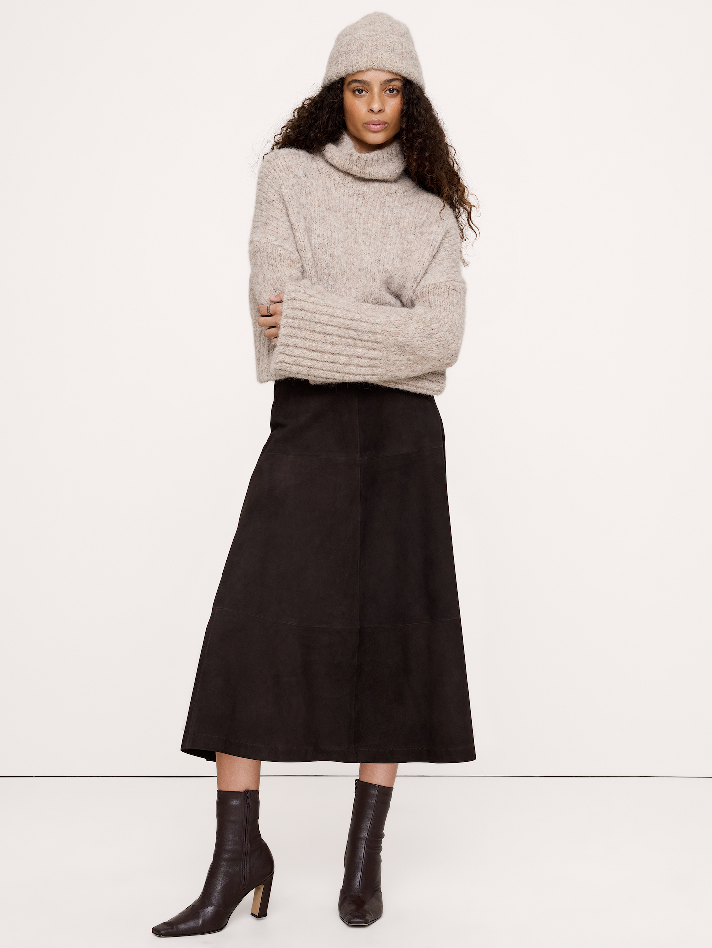 Image 1 of 6, Spun from a soft alpaca blend for extra cozy appeal, this cropped sweater is cut for a loose fit that's easy to layer through the seasons., Ultra-Oversized Fit: Lots of room through chest, shoulders, and waist. Dropped shoulder seam., Fabric from Italy's Pinori Filati mill., Funnel neck., Flare sleeves., Straight hem., Product #1180215