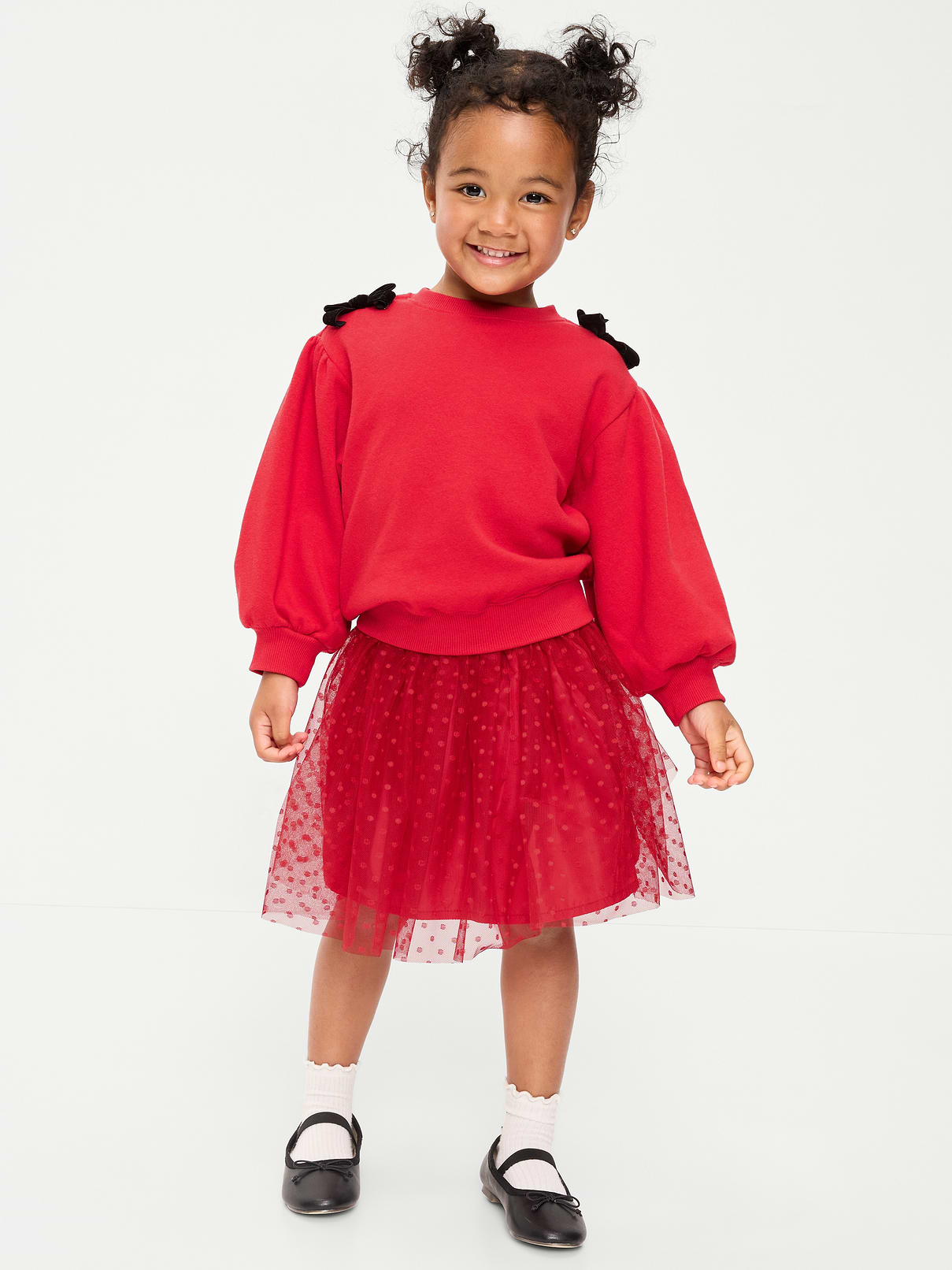 Image 1 of 4, crew neck, long sleeves, decorative bows at shoulders, coordinating skirt, elasticized waistband, mesh tulle skirt, Product #909140