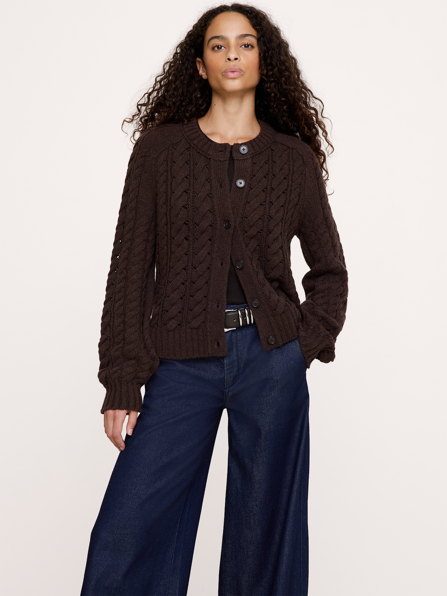 Image 1 of 7, This soft cable-knit cardigan brings together warm Merino and Yak wool using a drop-needle technique for a cozy, not-too-casual look., Relaxed Fit: A straight & roomy fit., Crew neck with button closure., Balloon sleeves., Straight hem., Product #1180221