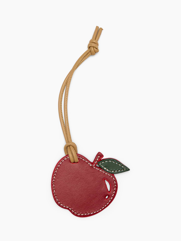 Image 1 of 1, Smooth leather apple-shaped bag charm., Leather cord attached., Product #1192964