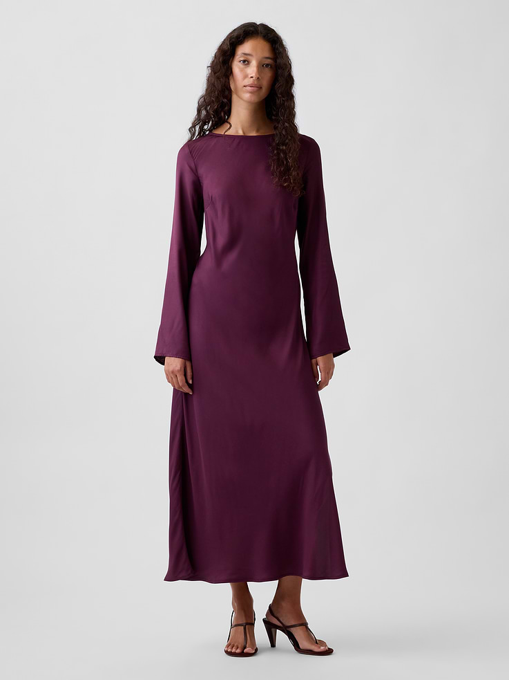 Image 1 of 5, Smooth rayon twill maxi dress., Boatneck with back loop button keyhole closure., Long bell sleeves., Bust darts., Bias cut., Side slit., This product was made in a factory that invests in gender equity and women’s empowerment through RISE. Learn more at gapinc.com/equity ., Product #1184725