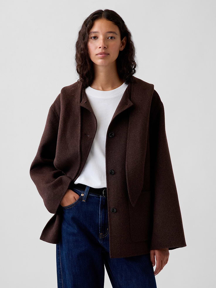 Image 1 of 6, Soft wool-blend coat. In a relaxed fit., Hooded tie neck., Long sleeves., Button front., Front patch pockets., Made with 52% recycled wool. Compared to virgin materials, using recycled materials helps reduce resource use and waste., Made with 40% recycled polyester. Compared to virgin materials, using recycled materials helps reduce resource use and waste., This product was made in a factory that invests in gender equity and women’s empowerment through RISE. Learn more at gapinc.com/equity ., Product #1182546