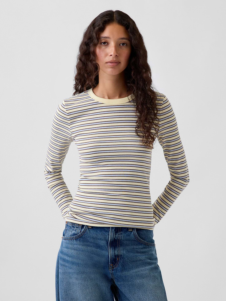 Image 1 of 5, Our soft & stretchy cotton-modal blend that hugs you just right. It’s your new 7-days-a-week essential., Soft, stretch cotton-modal blend T-Shirt in a slightly cropped length., Crewneck., Long sleeves., This product was made in a factory that invests in gender equity and women’s empowerment through RISE. Learn more at gapinc.com/equity ., Product #801470