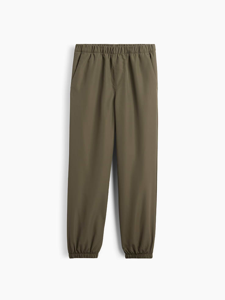 Image 1 of 3, This product is made with/contains 23% recycled polyester. Compared to virgin materials, using recycled materials helps reduce resource use and waste., Smooth water and wind-resistant outer., Interior fleece lining., Elasticized waist, faux fly., Front slant pockets., Elasticized cuffs., Product #1185345